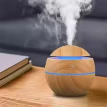 Ultrasonic aroma diffuser with LED mood lights in bedroom